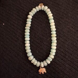 Elegant Blue Beaded Necklace with Gold Elephant Charm